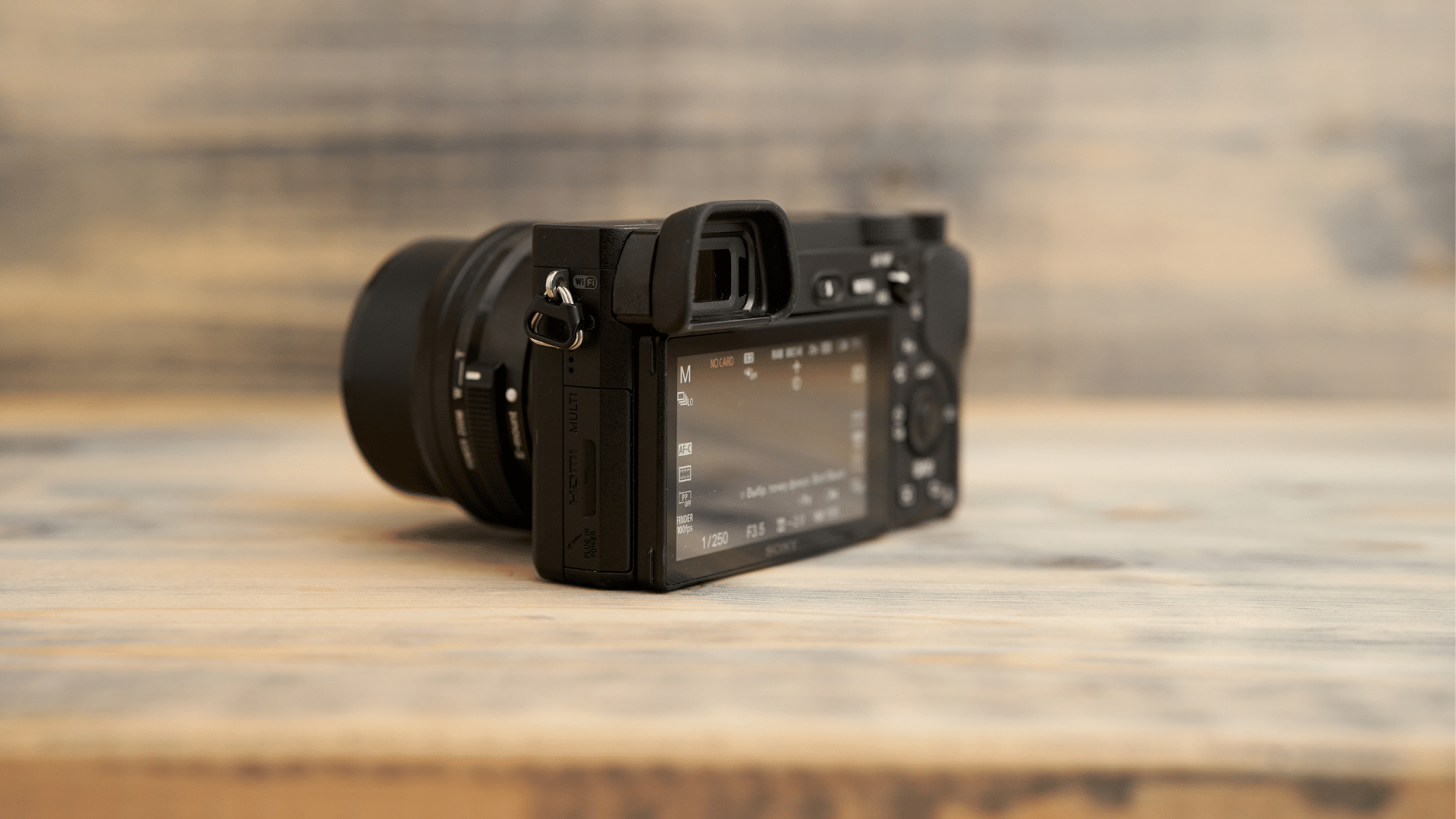 An image showing the back of a mirrorless camera with a digital display instead of a traditional optical viewfinder, illustrating what is a mirrorless camera.